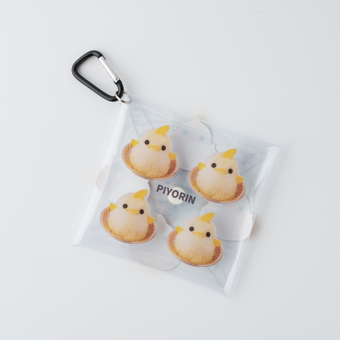 【7月1日（月）12時 販売開始】 ぴよりんクリアマルチケース（写真）